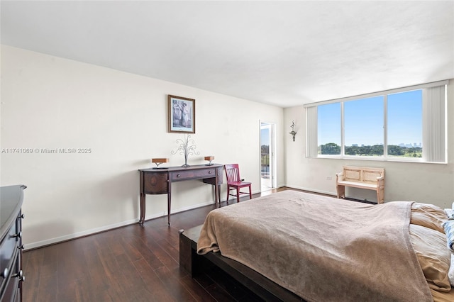 bedroom featuring dark hardwood / wood-style floors