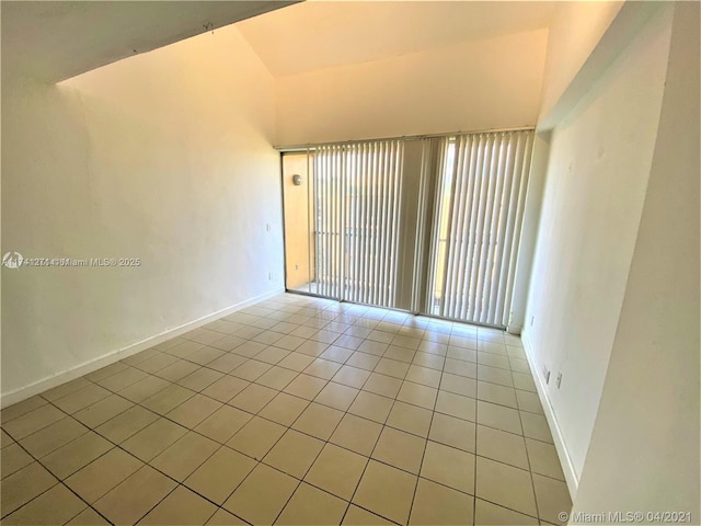 spare room with light tile patterned floors