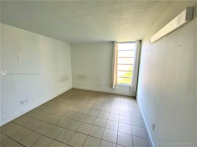 view of tiled empty room