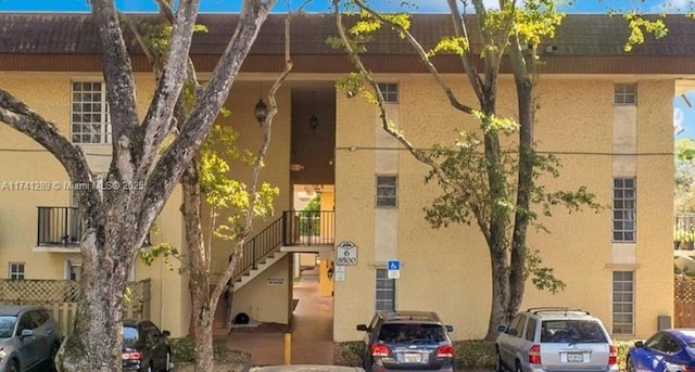 8600 SW 109th Ave Unit 4-216, Miami, FL 33173 - view of apartment building / complex featuring uncovered parking