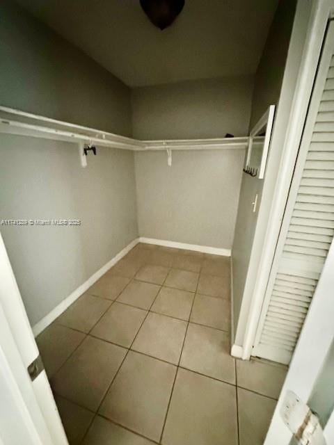8600 SW 109th Ave Unit 4-216, Miami, FL 33173 - spacious closet with tile patterned flooring