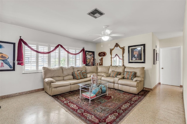 living room featuring ceiling fan