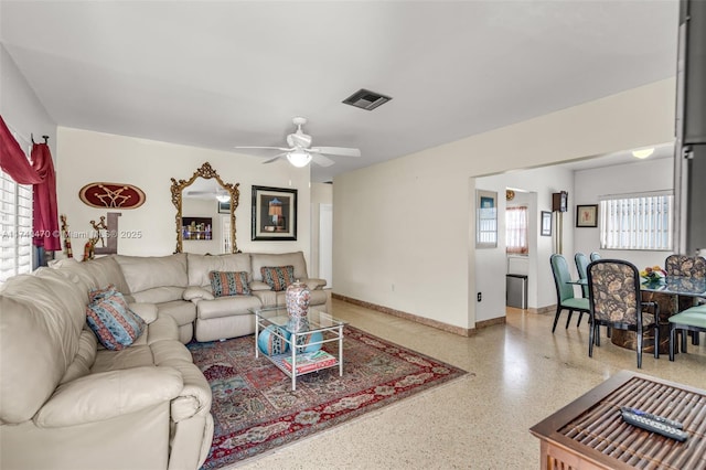 living room with ceiling fan