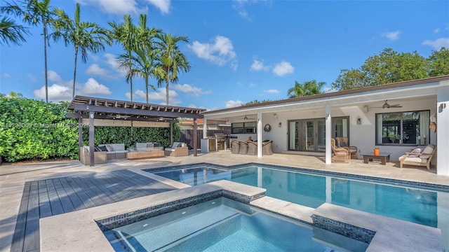 view of swimming pool featuring ceiling fan, an outdoor living space, a patio area, area for grilling, and an in ground hot tub