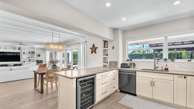 kitchen with dishwasher, sink, beverage cooler, kitchen peninsula, and light hardwood / wood-style flooring