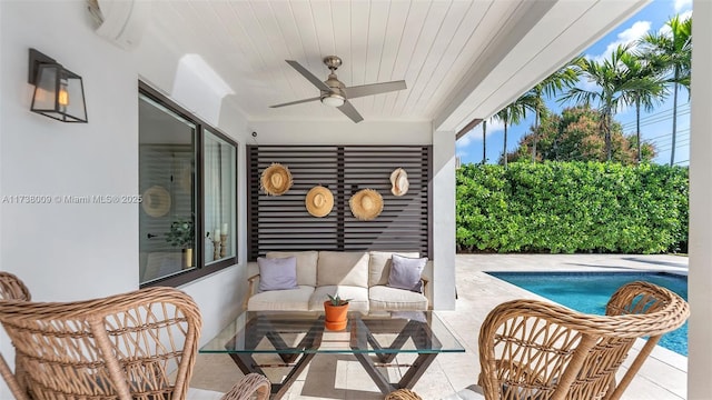 exterior space featuring an outdoor living space, a wall unit AC, and ceiling fan