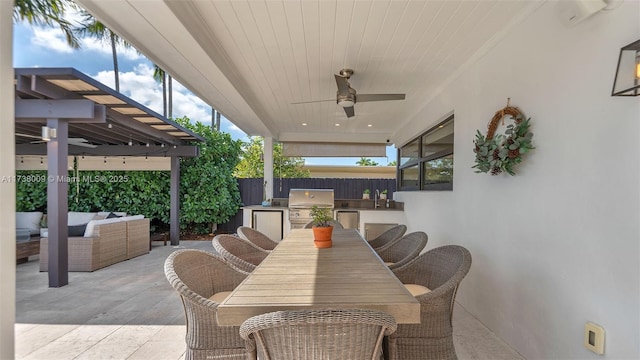 view of patio / terrace featuring area for grilling, an outdoor living space, and ceiling fan