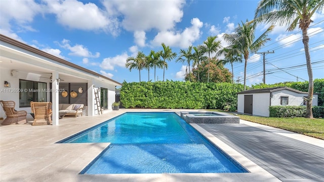 view of swimming pool featuring ceiling fan, a patio area, an outdoor structure, an outdoor hangout area, and an in ground hot tub