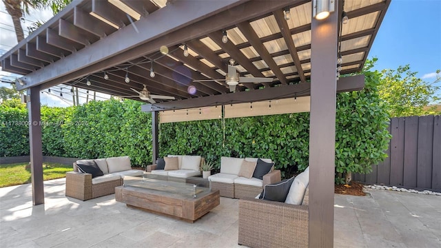 view of patio featuring an outdoor hangout area and ceiling fan