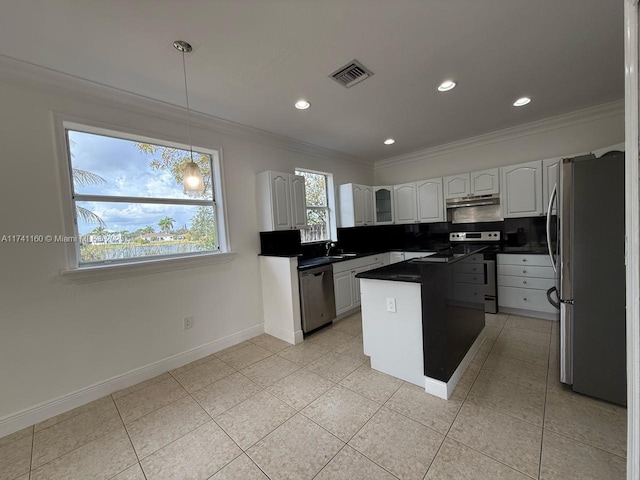 kitchen with stainless steel appliances, visible vents, white cabinetry, dark countertops, and decorative light fixtures