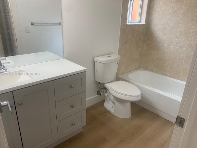 2511 NE 41st Ter, Homestead, FL 33033 - full bathroom with tiled shower / bath, vanity, toilet, and hardwood / wood-style floors