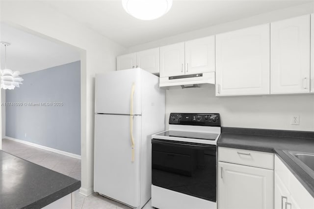 kitchen featuring white cabinetry, light tile patterned floors, range with electric stovetop, and white refrigerator