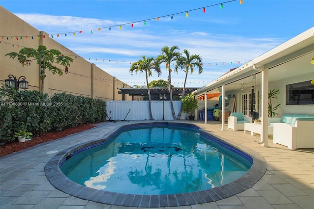 view of swimming pool with a patio area