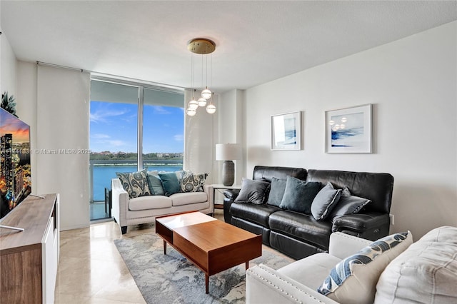 2681 N Flamingo Rd Unit 605S, Sunrise, FL 33323 - living room featuring floor to ceiling windows and a water view