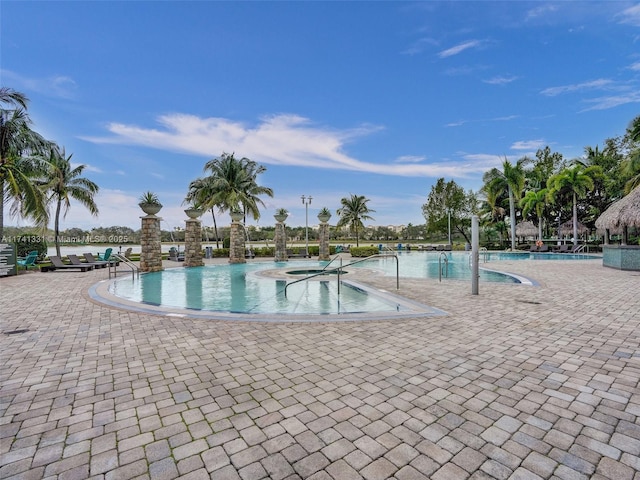2681 N Flamingo Rd Unit 605S, Sunrise, FL 33323 - community pool featuring a hot tub and a patio