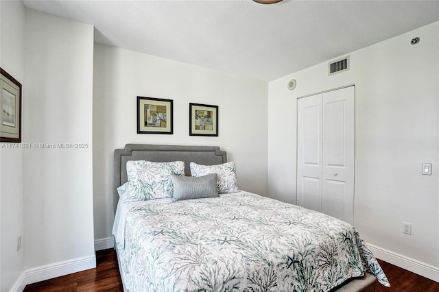 2681 N Flamingo Rd Unit 605S, Sunrise, FL 33323 - bedroom featuring a closet, wood finished floors, and baseboards