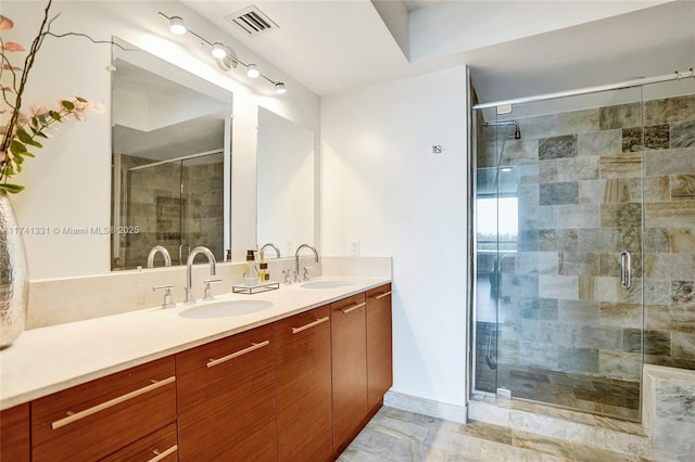 2681 N Flamingo Rd Unit 605S, Sunrise, FL 33323 - bathroom with double vanity and a shower stall