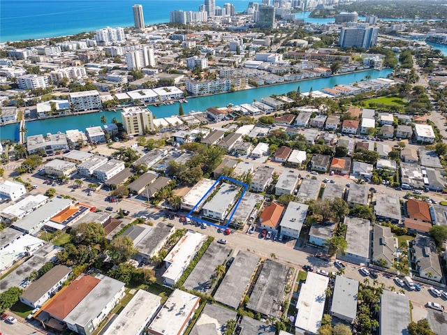 bird's eye view with a water view