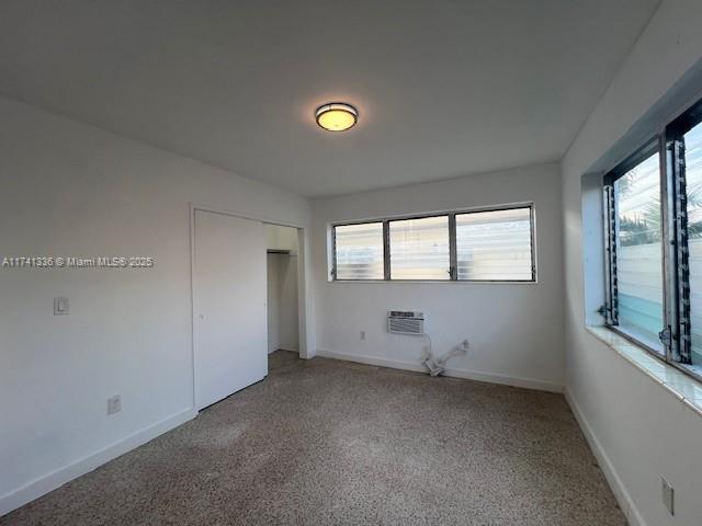 unfurnished bedroom with a closet