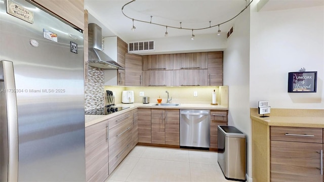 600 N Three Islands Blvd Unit 803, Hallandale Beach, FL 33009 - kitchen featuring backsplash, visible vents, a sink, stainless steel appliances, and wall chimney exhaust hood