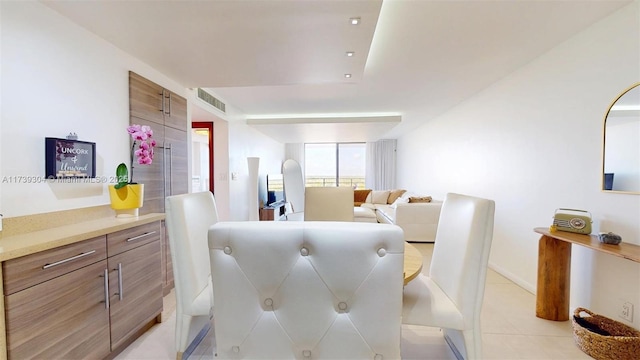 600 N Three Islands Blvd Unit 803, Hallandale Beach, FL 33009 - dining room with visible vents and light tile patterned floors