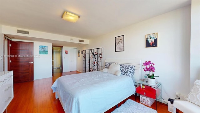600 N Three Islands Blvd Unit 803, Hallandale Beach, FL 33009 - bedroom with visible vents and wood finished floors