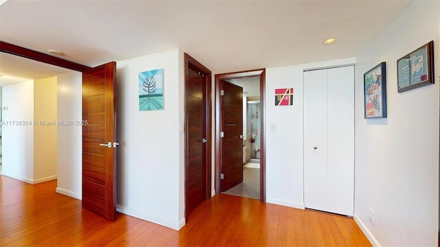 600 N Three Islands Blvd Unit 803, Hallandale Beach, FL 33009 - hall featuring recessed lighting, baseboards, and light wood-style flooring