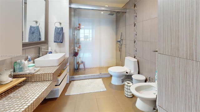 600 N Three Islands Blvd Unit 803, Hallandale Beach, FL 33009 - bathroom with tile walls, tile patterned flooring, a stall shower, a sink, and toilet