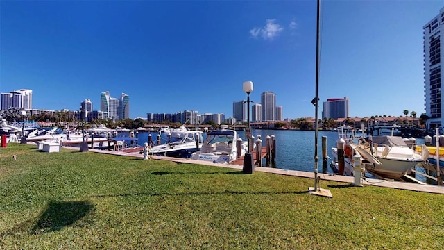 600 N Three Islands Blvd Unit 803, Hallandale Beach, FL 33009 - view of dock with a lawn, a view of city, and a water view
