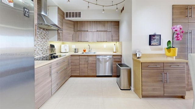600 N Three Islands Blvd Unit 803, Hallandale Beach, FL 33009 - kitchen with visible vents, wall chimney range hood, light countertops, a sink, and stainless steel appliances
