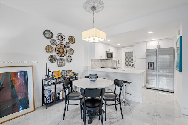 dining area with sink