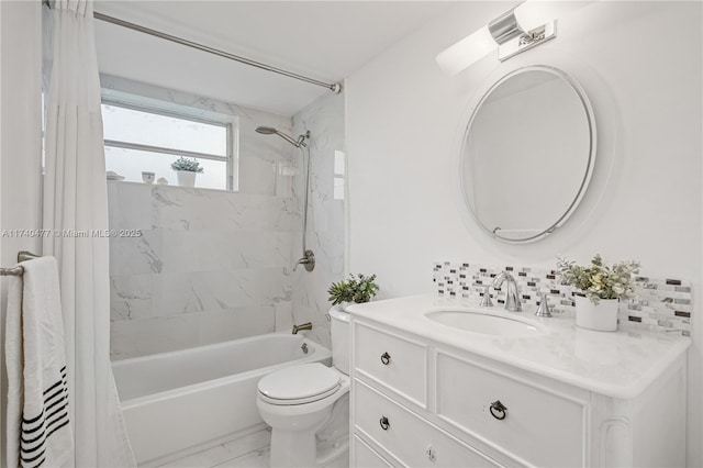 full bathroom with vanity, toilet, and shower / bath combo with shower curtain