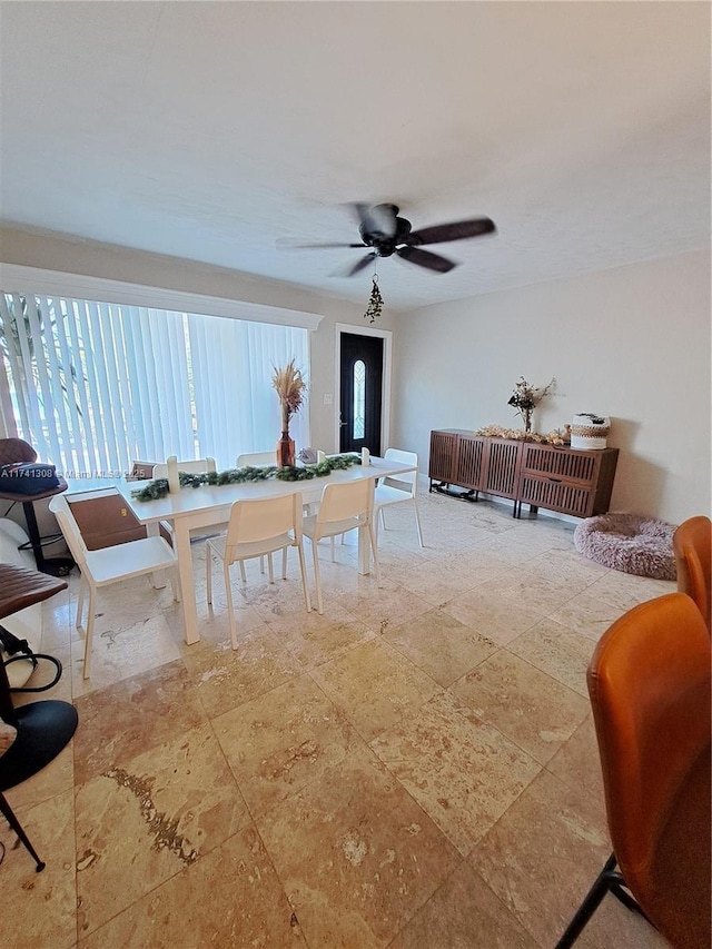 dining room with ceiling fan