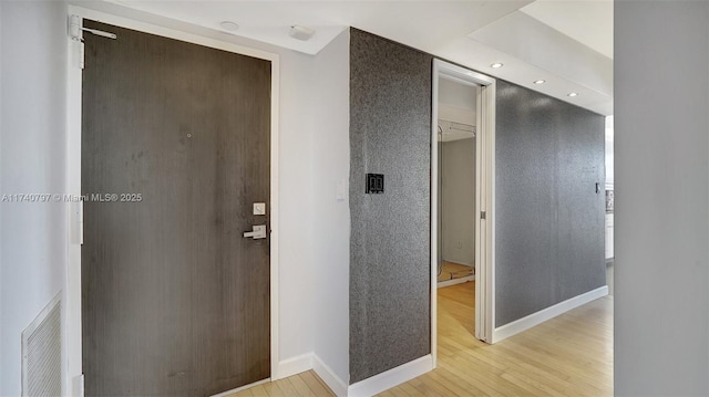 2801 NE 183rd St Unit 517W, Aventura, FL 33160 - hallway featuring light wood-style floors, baseboards, and recessed lighting