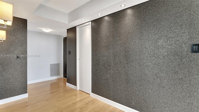 2801 NE 183rd St Unit 517W, Aventura, FL 33160 - hall featuring light wood-style flooring, baseboards, and recessed lighting