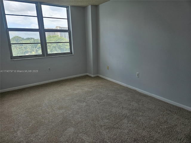 2801 NE 183rd St Unit 517W, Aventura, FL 33160 - spare room featuring carpet flooring and baseboards