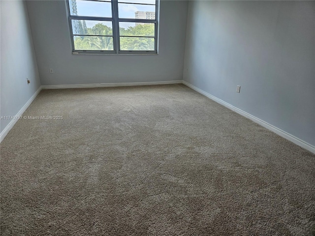 2801 NE 183rd St Unit 517W, Aventura, FL 33160 - carpeted spare room with baseboards
