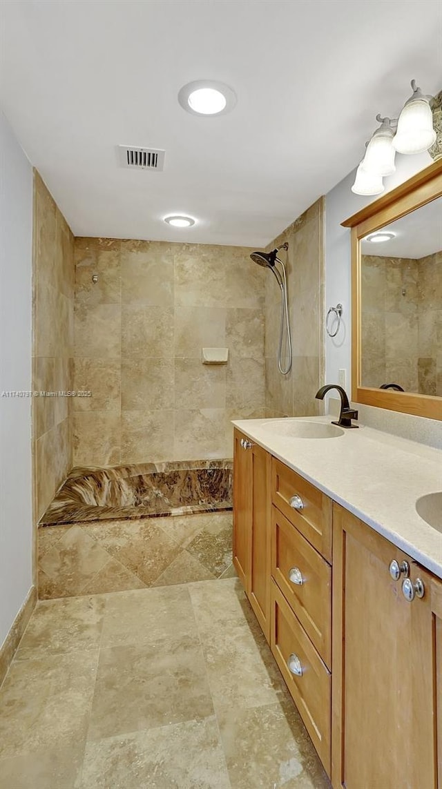 2801 NE 183rd St Unit 517W, Aventura, FL 33160 - bathroom with a tile shower and double vanity