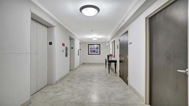 2801 NE 183rd St Unit 517W, Aventura, FL 33160 - corridor featuring elevator and ornamental molding
