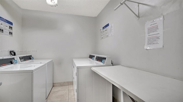 2801 NE 183rd St Unit 517W, Aventura, FL 33160 - shared laundry featuring separate washer and dryer and light tile patterned floors