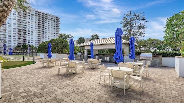 2801 NE 183rd St Unit 517W, Aventura, FL 33160 - view of patio featuring outdoor dining area and a gazebo