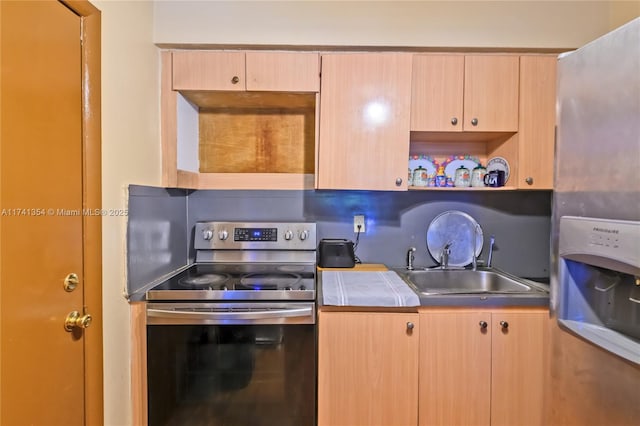 kitchen with sink, decorative backsplash, stainless steel electric stove, and light brown cabinets