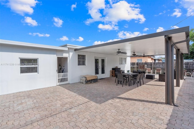 view of patio with ceiling fan and french doors