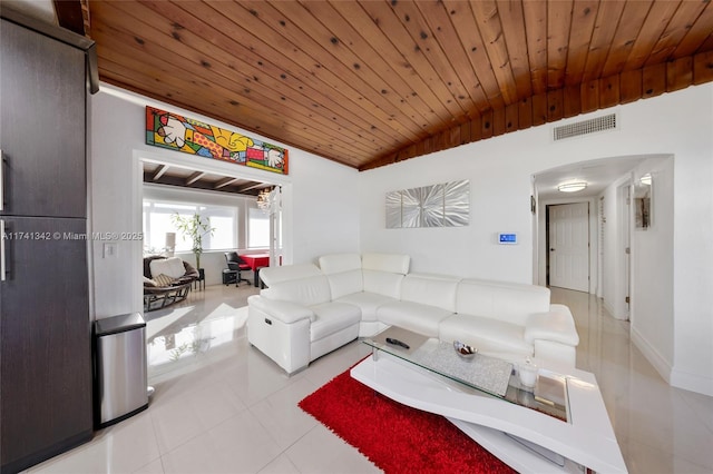 tiled living room with lofted ceiling and wood ceiling