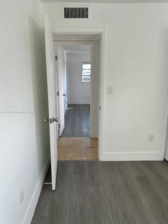 hall featuring dark hardwood / wood-style flooring