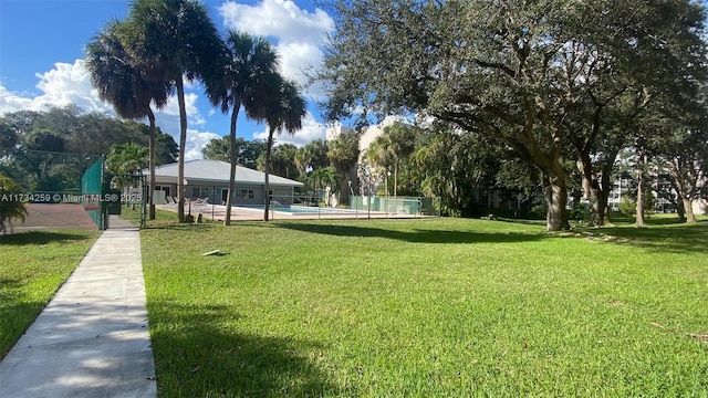 view of home's community featuring a yard