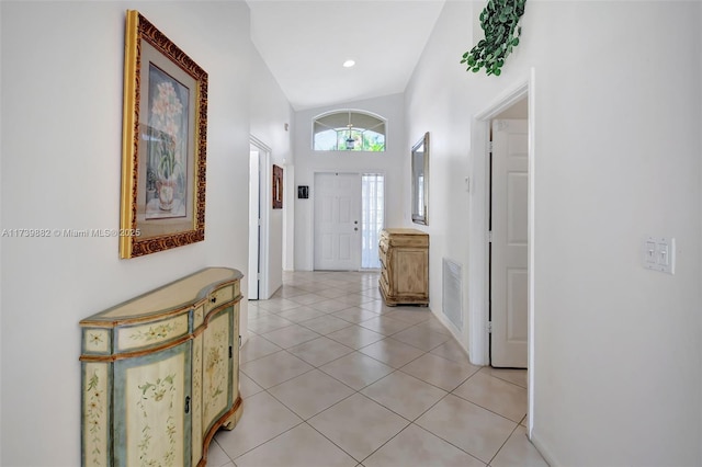 hallway with light tile patterned floors