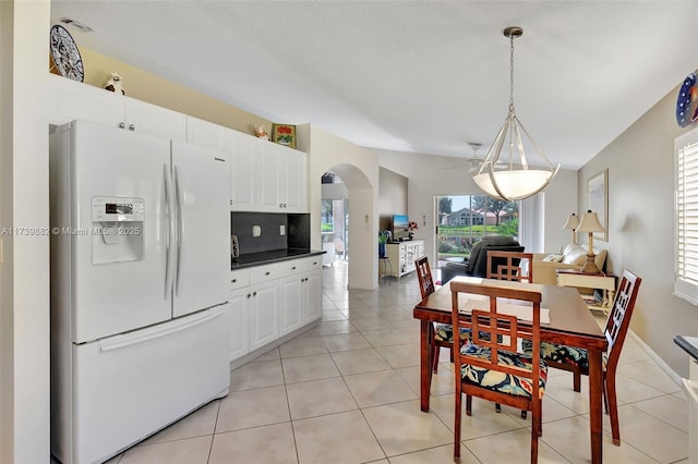 view of tiled dining space