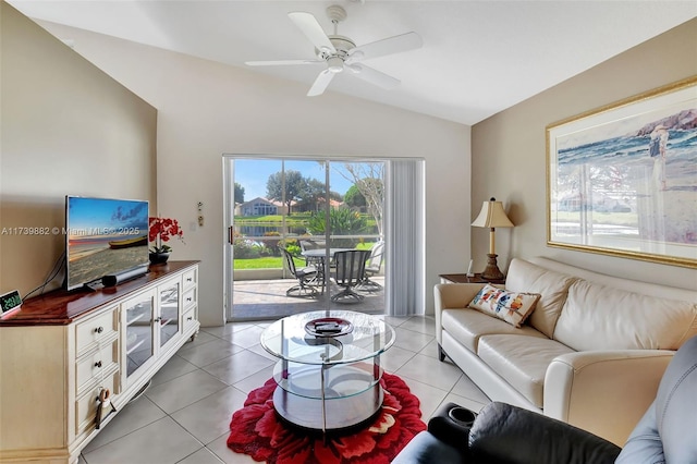 living room with vaulted ceiling, light tile patterned flooring, and ceiling fan