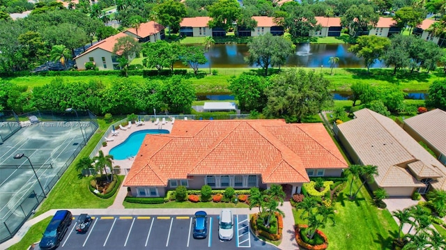 drone / aerial view featuring a water view